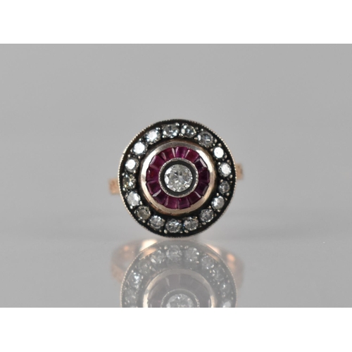 80 - A Middle Eastern Diamond and Ruby Ring, Central Round Cut Diamond Bezel Set Measuring 4mm Diameter, ... 