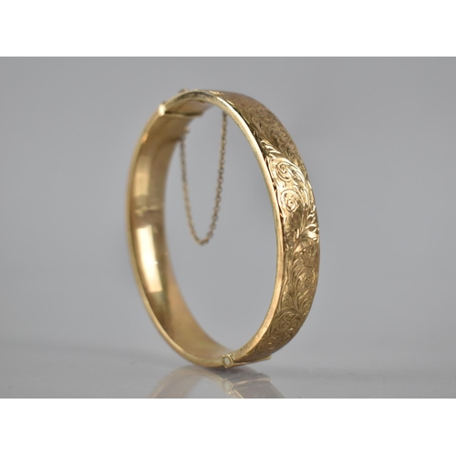 87 - A Vintage 9ct Gold Hinged Bangle, Engraved Scrolling Foliate Decoration to Front Panel, 13.7gms, Int... 