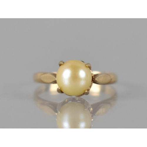 91 - A Nice Quality 9ct Gold and Pearl Ladies Dress Ring, Central Pearl Measuring 7mm Diameter and Raised... 