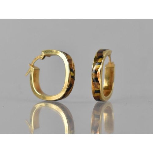 47 - A Pair of 9ct Gold and Enamelled Hoop Earrings, Central Wavy Channel decorated in Black, Gold and Br... 