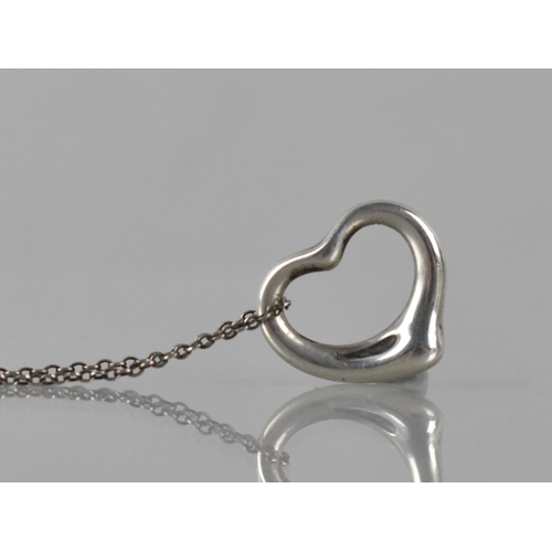 145 - Tiffany and Co: Elsa Peretti Heart Shaped Pendant on Chain, Signs of Wear and Use and with Rubbing t... 