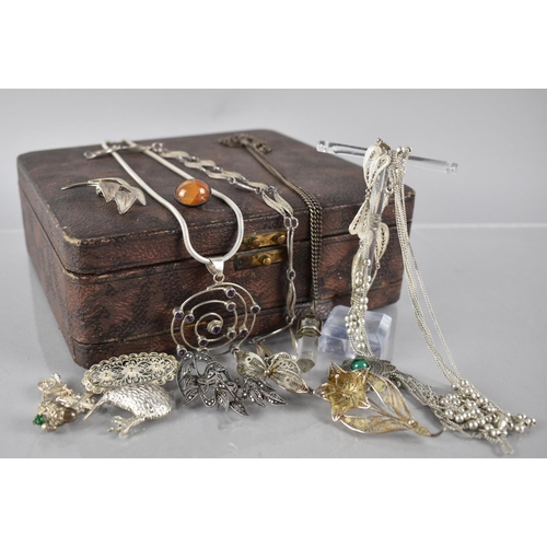 212 - An Antique Leather Mounted Jewellery Box containing Large Collection of Silver and White Metal Jewel... 