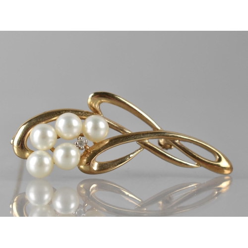 84 - A 9ct Gold, Pearl and Diamond Brooch, Five Pearls Measuring 5.5mm Diameter and Four Claw White Metal... 