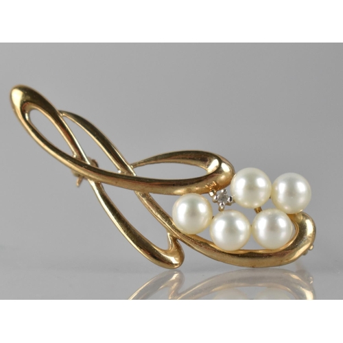 84 - A 9ct Gold, Pearl and Diamond Brooch, Five Pearls Measuring 5.5mm Diameter and Four Claw White Metal... 