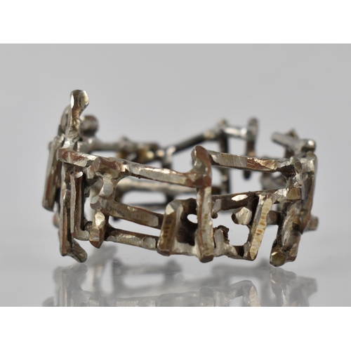 184 - An Unusual Brutalist, Cut Steel, Hinged Bangle Formed From Steel Rods, Somewhat Rusted in Places, Un... 