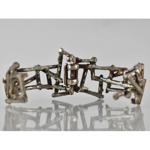 184 - An Unusual Brutalist, Cut Steel, Hinged Bangle Formed From Steel Rods, Somewhat Rusted in Places, Un... 