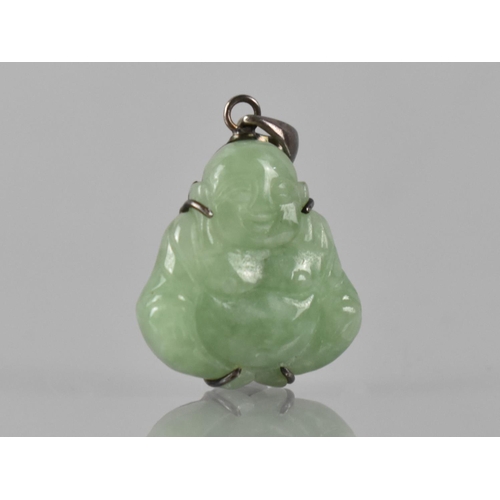 214 - A Silver Mounted Jade Pendant, Carved as a Seated Buddha, Held in Four Silver Claws, 22mm Wide and 3... 