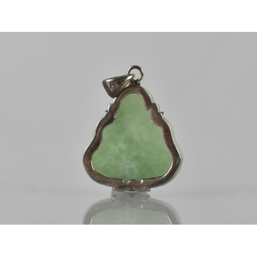 214 - A Silver Mounted Jade Pendant, Carved as a Seated Buddha, Held in Four Silver Claws, 22mm Wide and 3... 