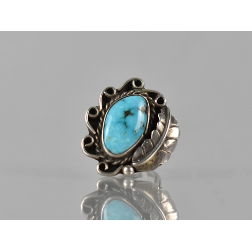 150 - A Large Turquoise Mounted Navajo Ring in Unmarked White Metal, Irregular Turquoise Cabochon Measurin... 