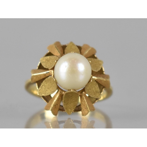 28 - An Eastern Gold Metal and Pearl Ladies Dress Ring, Raised Pearl Measuring 7mm Diameter and Set in St... 