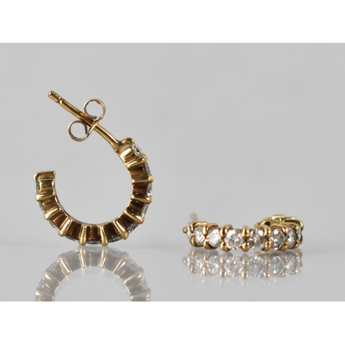33 - A Pair of Diamond and 9ct Gold Hooped Earrings, Eleven Round Brilliant Cut Diamonds Each Measuring A... 