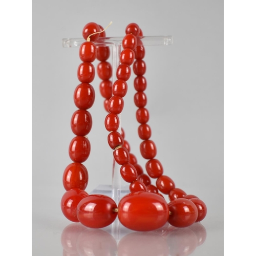 217 - A Vintage Red Bakelite Bead Necklace, 43.7gms, Largest Bead 22mm Wide, 58.5cms Long Total, Screw Car... 