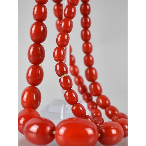 217 - A Vintage Red Bakelite Bead Necklace, 43.7gms, Largest Bead 22mm Wide, 58.5cms Long Total, Screw Car... 