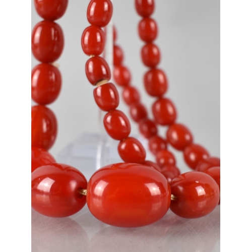 217 - A Vintage Red Bakelite Bead Necklace, 43.7gms, Largest Bead 22mm Wide, 58.5cms Long Total, Screw Car... 