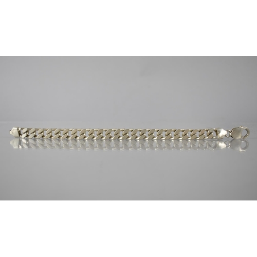 195 - A Heavy Silver Flat Curb Link Bracelet, Stamped 925 to Lobster Clasp, 30gms