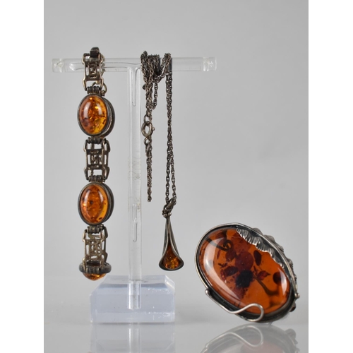 225 - Three Silver Mounted Amber Items to include Panelled Bracelet comprising Five Oval Amber Cabochons, ... 