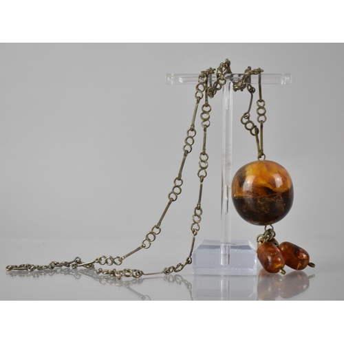 226 - A Continental/North African Low Grade Silver (Probably 800) Necklace with Amber Pendant, 30mm Diamet... 