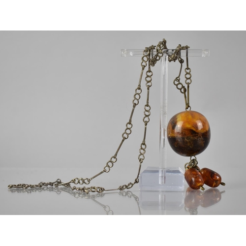 226 - A Continental/North African Low Grade Silver (Probably 800) Necklace with Amber Pendant, 30mm Diamet... 