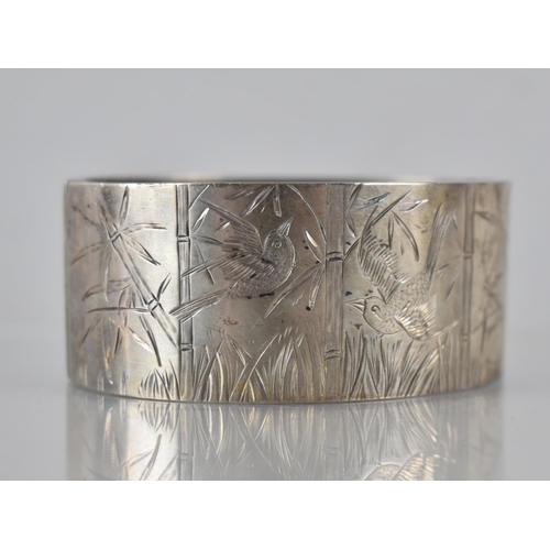 156 - A Victorian Silver Aesthetic Hinged Bangle, Engraved Bird and Bamboo Decoration to Front Panel 30mm ... 