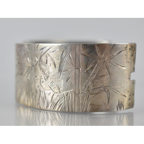 156 - A Victorian Silver Aesthetic Hinged Bangle, Engraved Bird and Bamboo Decoration to Front Panel 30mm ... 