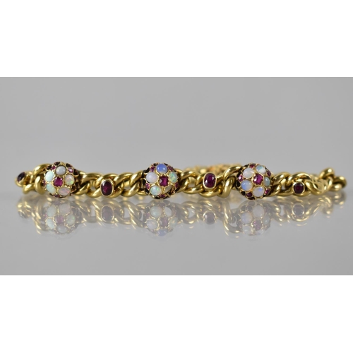 7 - A Ruby, Opal and Gold Metal Bracelet comprising Three Raised Jewelled Roundels, Each with Central Mi... 