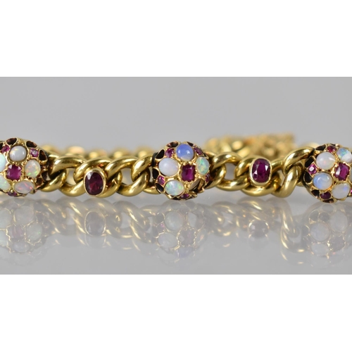 7 - A Ruby, Opal and Gold Metal Bracelet comprising Three Raised Jewelled Roundels, Each with Central Mi... 