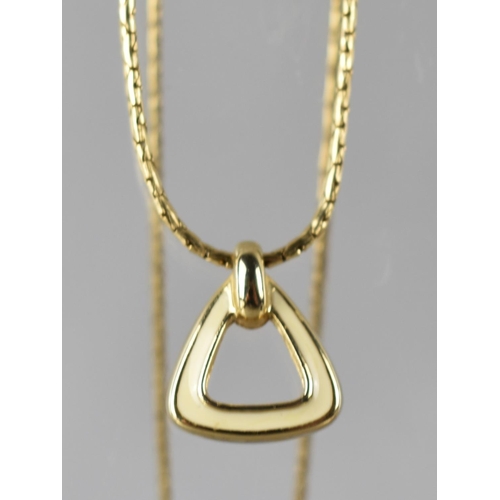 236 - A Christian Dior Necklace, Gilt and White Enamel Triangular Pendant on Chain with Hanging Tag for Ch... 