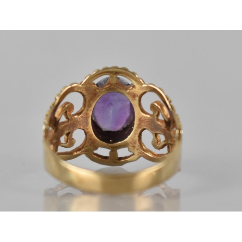58 - A 9ct Gold and Amethyst Dress Ring, Oval Cut Amethyst Measuring 8.5mm by 7mm Approx, Set in Eight Cl... 