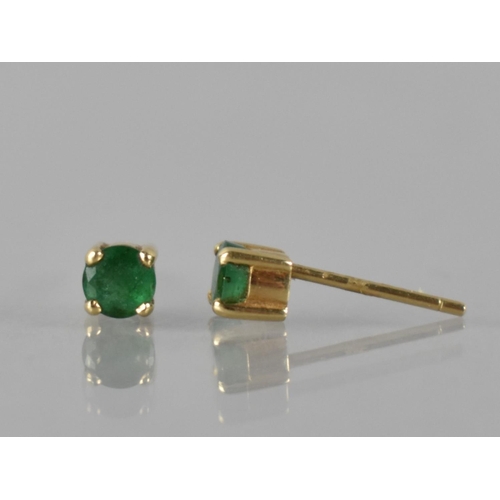 117 - A Pair of Gold Metal Mounted Emerald Solitaire Earrings, Round Cut Stones Measuring 3.5mm Diameter, ... 