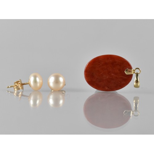 93 - A 14ct Gold Mounted Jasper Pendant, Oval Panel Measuring 20x30mm with a Total 29mm Drop, Stamped to ... 