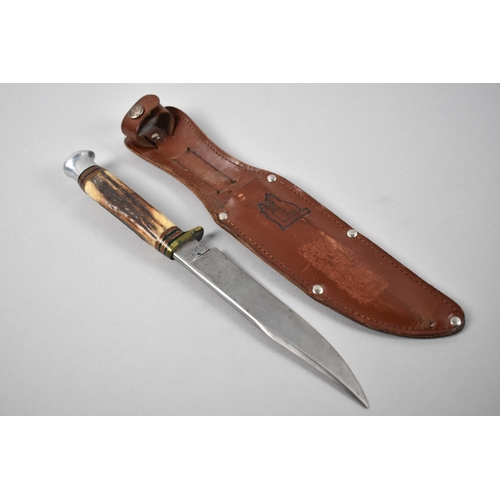 100 - A Mid 20th Century Bone Handled Hunting Knife by W R Fagan, with Leather Scabbard