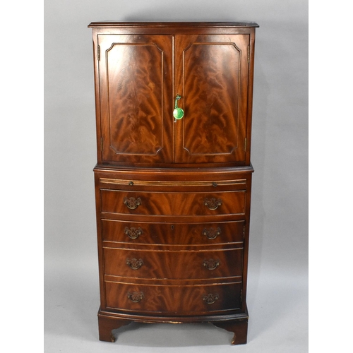 106 - A Modern Mahogany Bow Fronted Cocktail Cabinet, the Panelled Doors Opening to Shelved Mirrored Top S... 