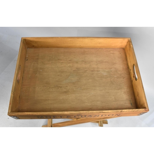 120 - A Reproduction Butlers Tray on Stand, The Sides Named with Various Brands of Champagne, 65x45cms