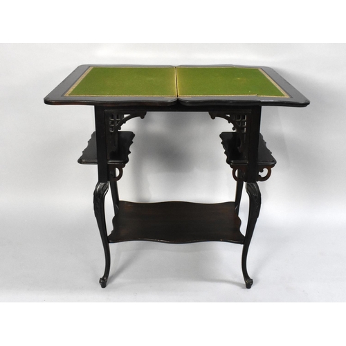 122 - An Edwardian Mahogany Games Table with Hinged Lift and Twist Top, One Panel Split, Two Side Piece Sh... 