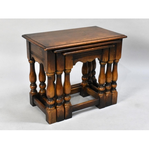 132 - A Mid/Late 20th Century Oak Nest of Three Tables, 51cms Wide