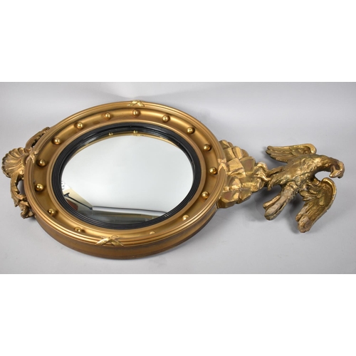 134 - A Large Regency Style Convex Mirror in Mouded Giltwood and Gesso Frame with Ball Decoration, Eagle F... 