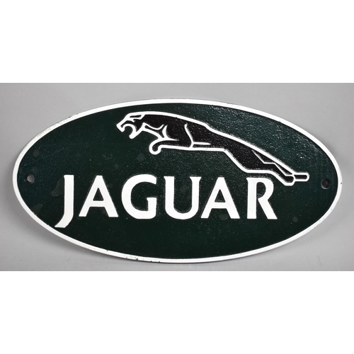 143 - A Reproduction Cast Metal Oval Sign for Jaguar, 35cms Long