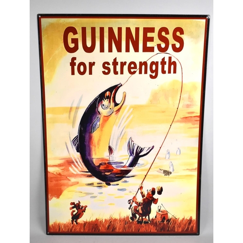 201 - A Reproduction Printed Advertising Sign on Tin, Guinness for Strength, 70x50cms