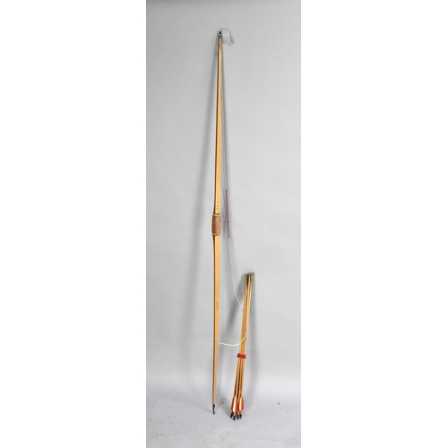 209 - A Bickerstaffe English Longbow Numbered R102105, 40lb Draw, Complete with Ten Brass Tipped Arrows