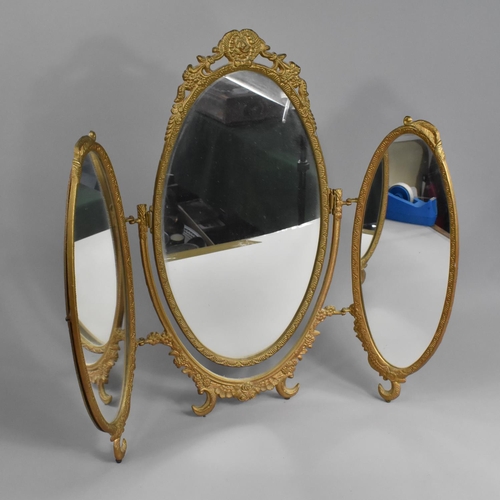 212 - A Mid 20th Century Gilt Metal Framed Triple Dressing Table Mirror, 62cms High