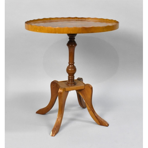 215 - A Late 20th Century Oval Topped Crossbanded Galleried Occasional Table on Four Scrolled Supports, 47... 