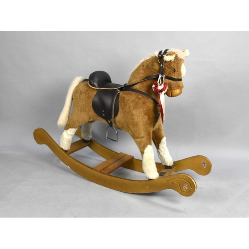 221 - A Modern Mama's and Papa's Rocking Horse with Leather Saddle and Bridle