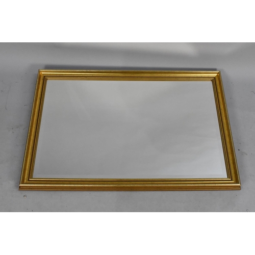 227 - A Modern Rectangular Bevelled Edge Wall Mirror, 97cms by 63cms