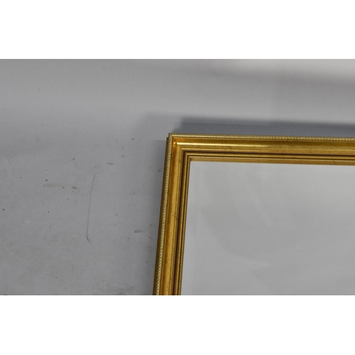 227 - A Modern Rectangular Bevelled Edge Wall Mirror, 97cms by 63cms