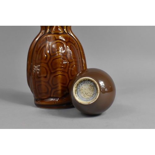 236 - A Chinese Tortoise and Snake Remedy Bottle (Empty), 22cm high Together with a Chinese Monochrome Bot... 