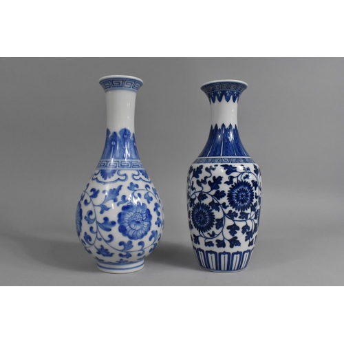 243 - A Chinese Blue and White Vase, Qianlong Mark to Base together with a Similar Example