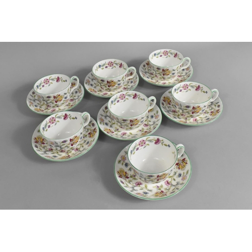 275 - A Minton Haddon Hall Pattern Tea Set to Comprise Seven Cups and Seven Saucers