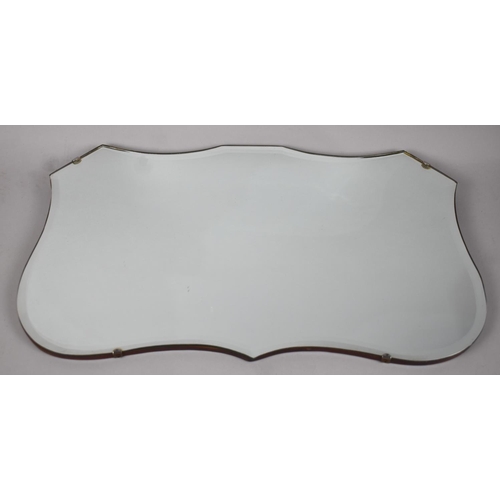 307 - A Shaped Bevel Edged Wall Mirror, 56x3415cm