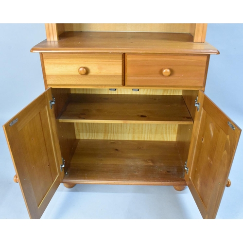 440 - A Modern Pine Bookcase with two Centre Drawers over Cupboard Base, 79cm Wide