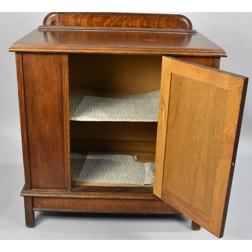 480 - A Galleried Oak Side Cabinet with Panelled Door, Matches Lot 479, 75cms Wide